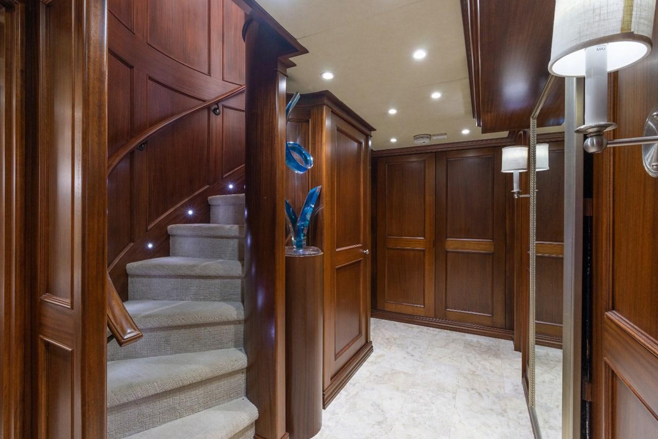 a staircase in a room aboard GITANA Yacht for Charter