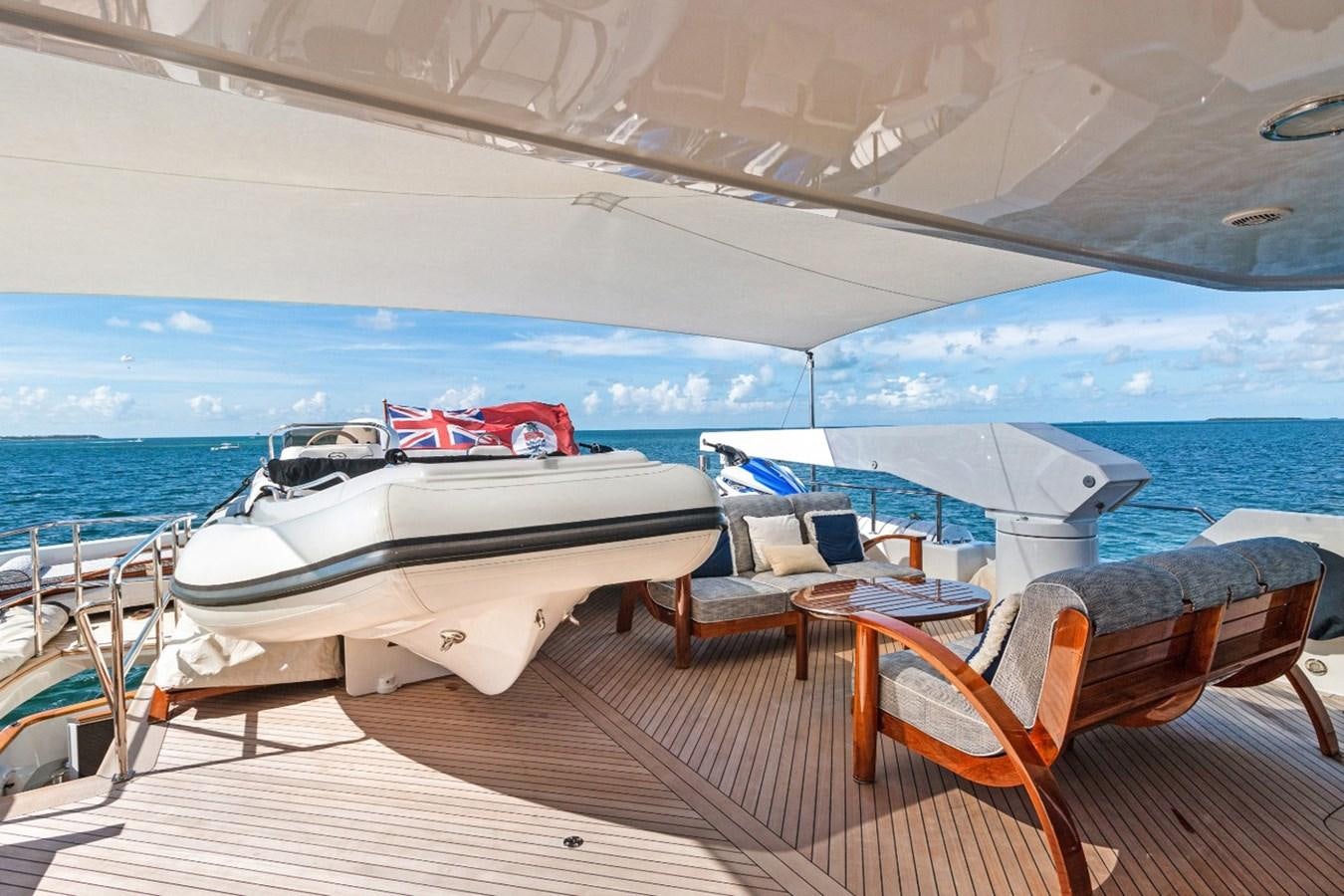 a boat on a deck aboard GITANA Yacht for Charter