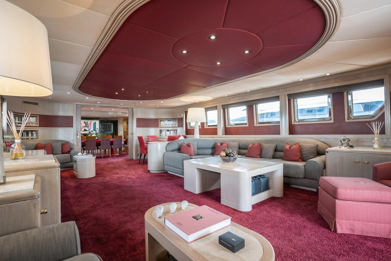 a living room with a pink carpet aboard CHEETAH MOON Yacht for Sale
