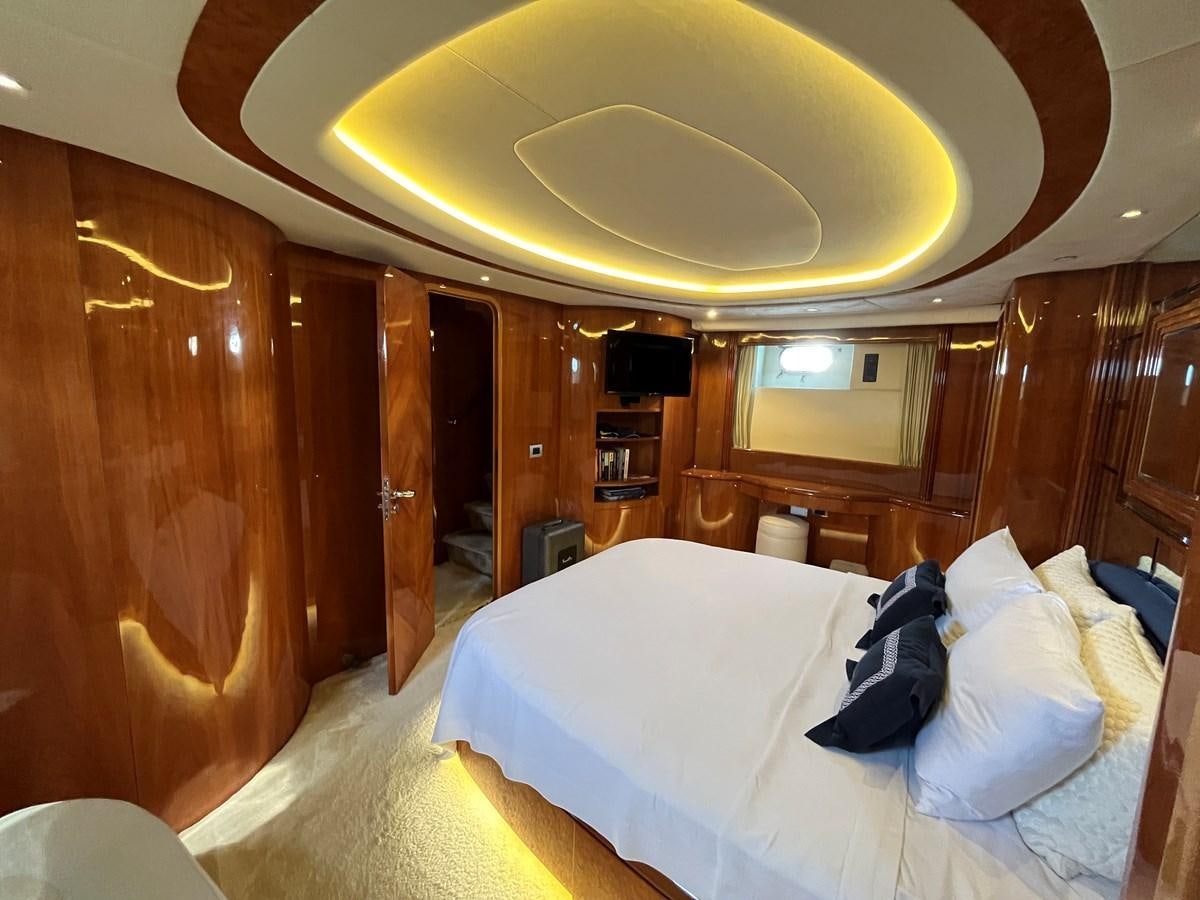 a bed in a room aboard AZIMUT 85 Yacht for Sale
