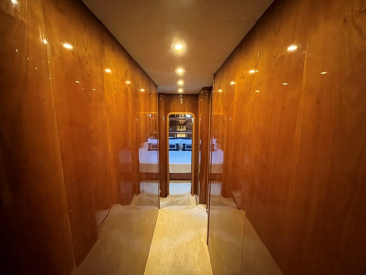 a hallway with wood walls aboard AZIMUT 85 Yacht for Sale