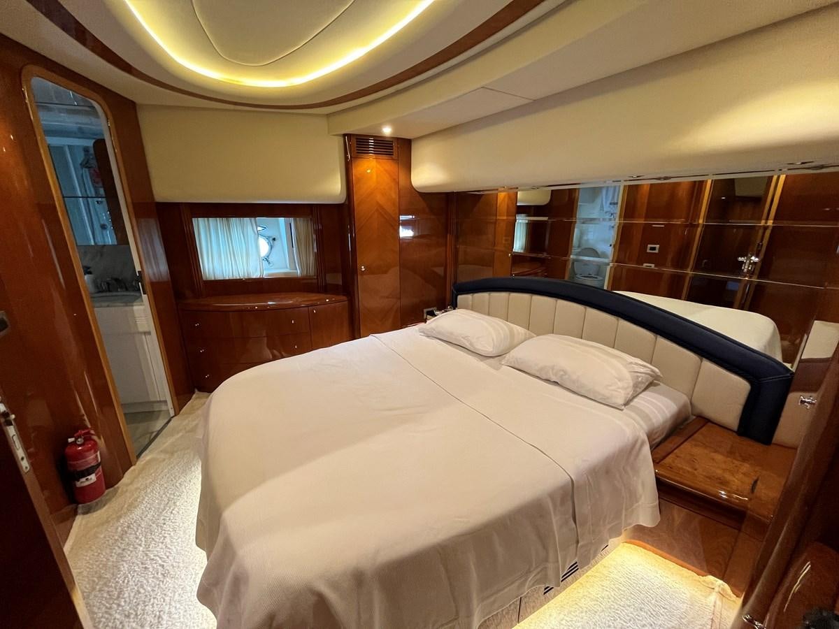 a bed in a room aboard AZIMUT 85 Yacht for Sale
