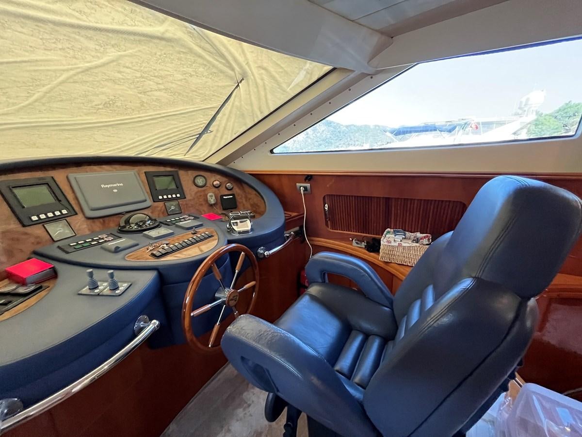 a plane with a desk and laptop aboard AZIMUT 85 Yacht for Sale