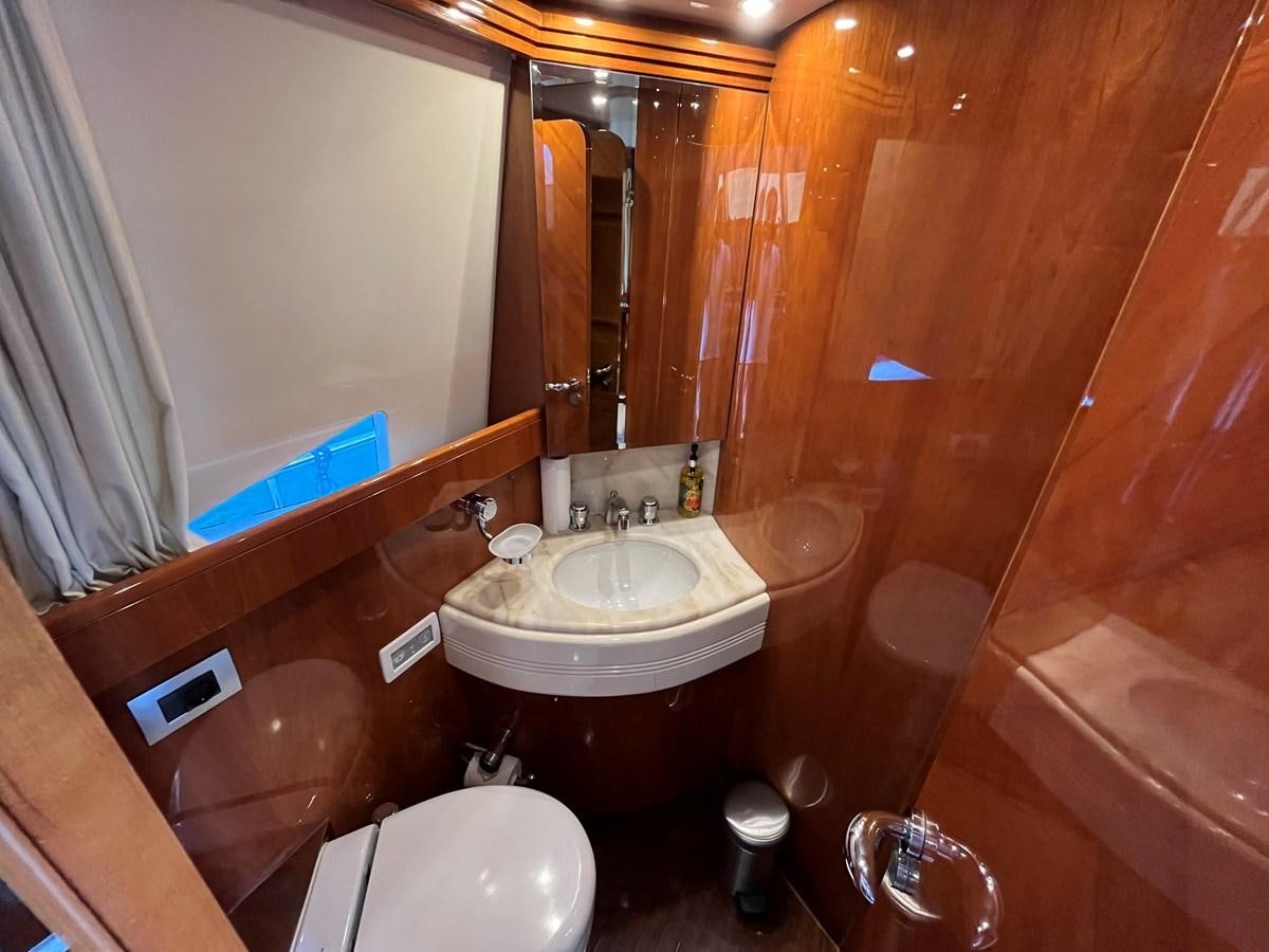 a bathroom with a sink and a toilet aboard AZIMUT 85 Yacht for Sale
