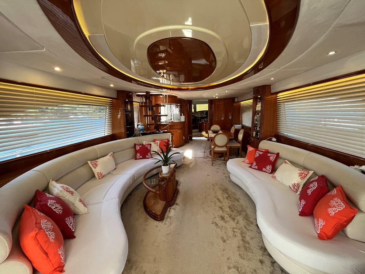 a large living room with a large mirror aboard AZIMUT 85 Yacht for Sale