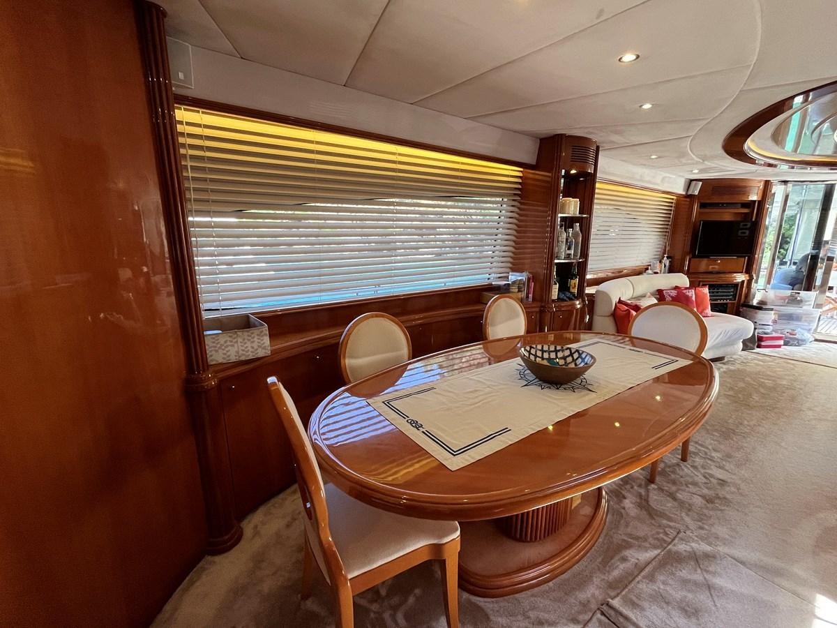 a dining table in a room aboard AZIMUT 85 Yacht for Sale