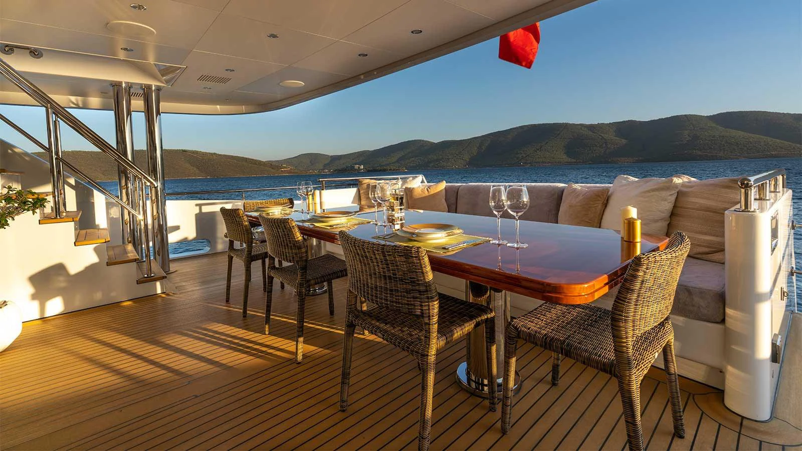 a table set for a meal aboard ILERIA Yacht for Sale