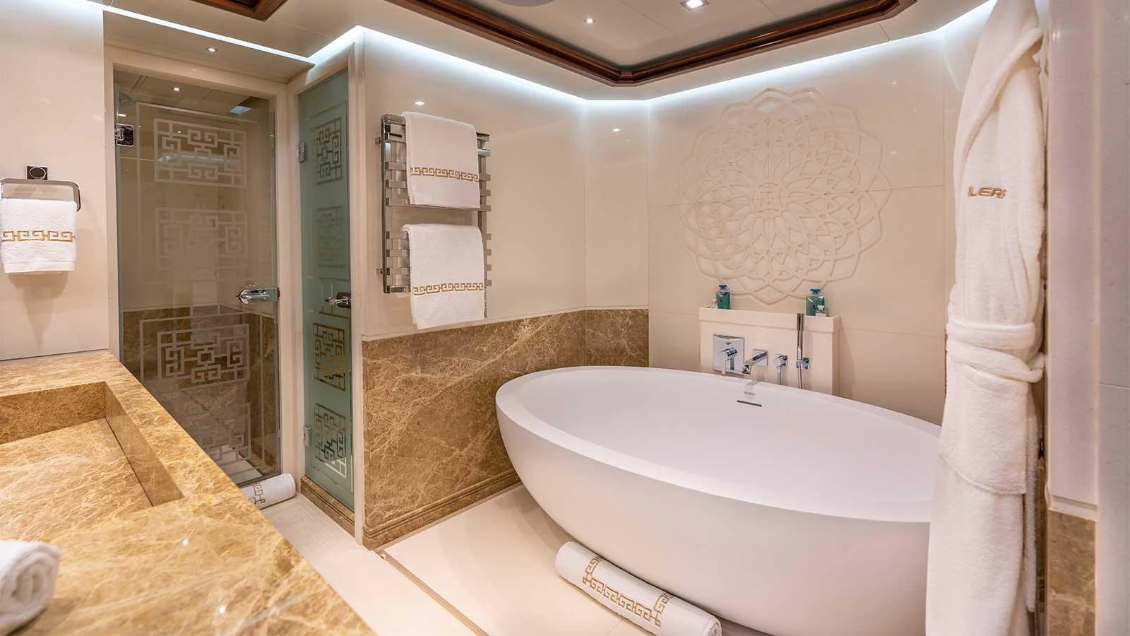 a bathroom with a bathtub and a sink aboard ILERIA Yacht for Sale