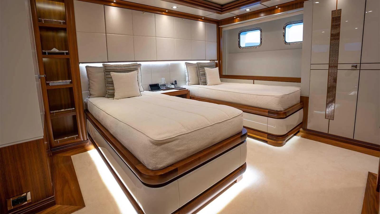 a room with two beds aboard ILERIA Yacht for Sale
