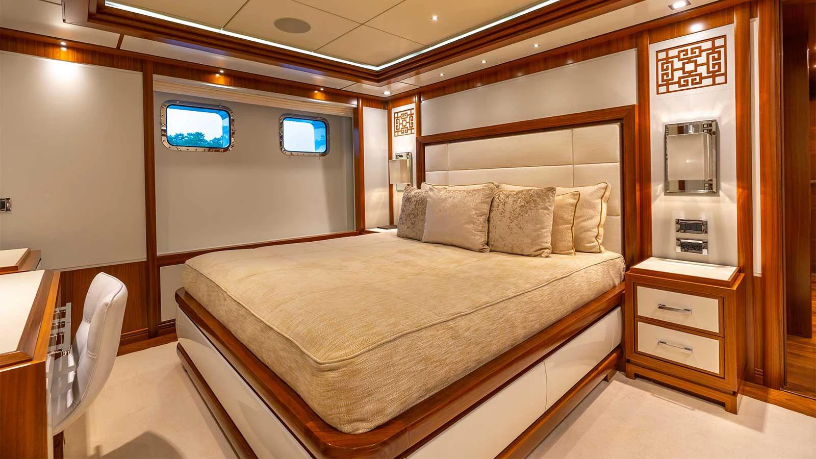 a bed in a room aboard ILERIA Yacht for Sale