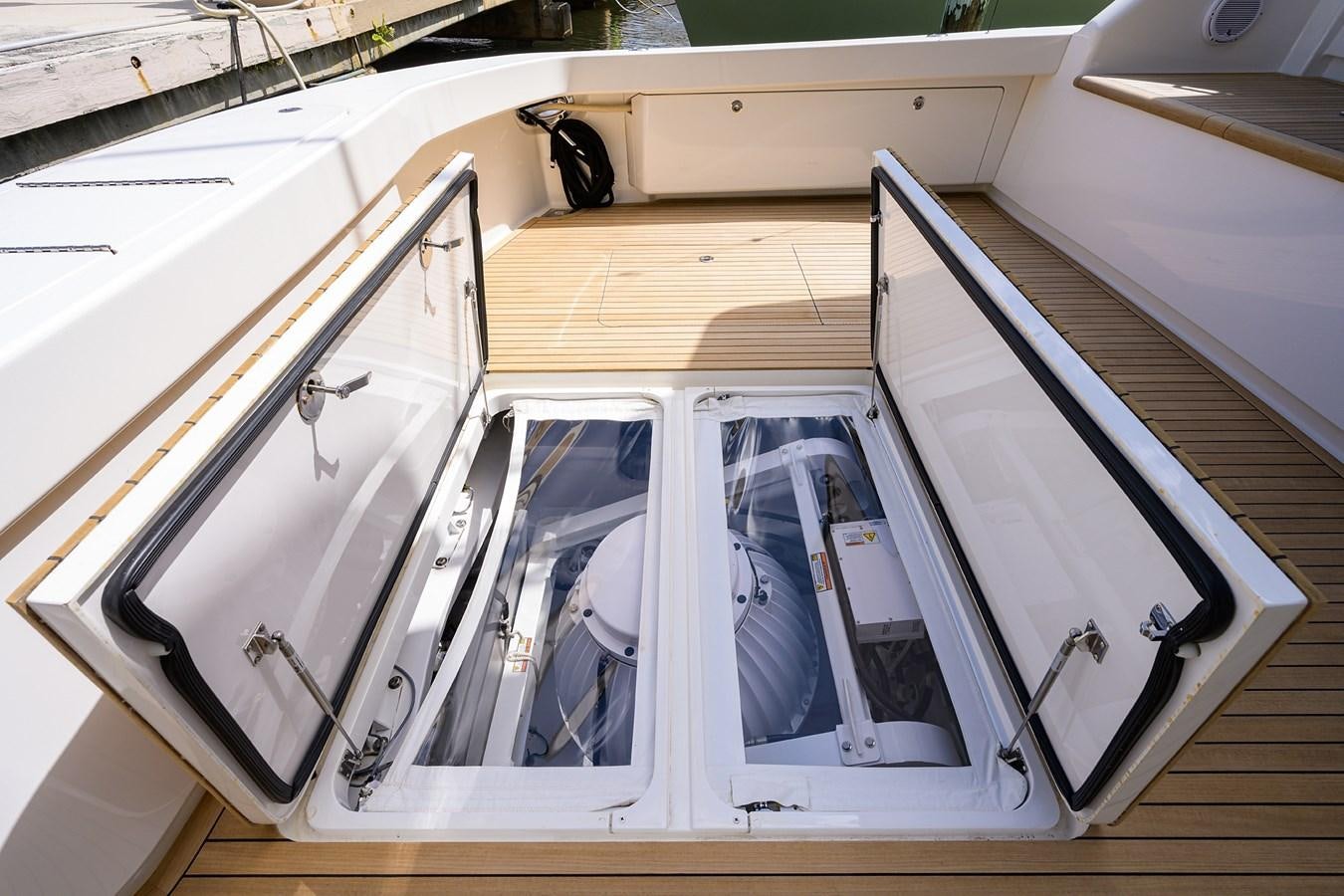 a close-up of a car aboard ENCLOSED BRIDGE Yacht for Sale