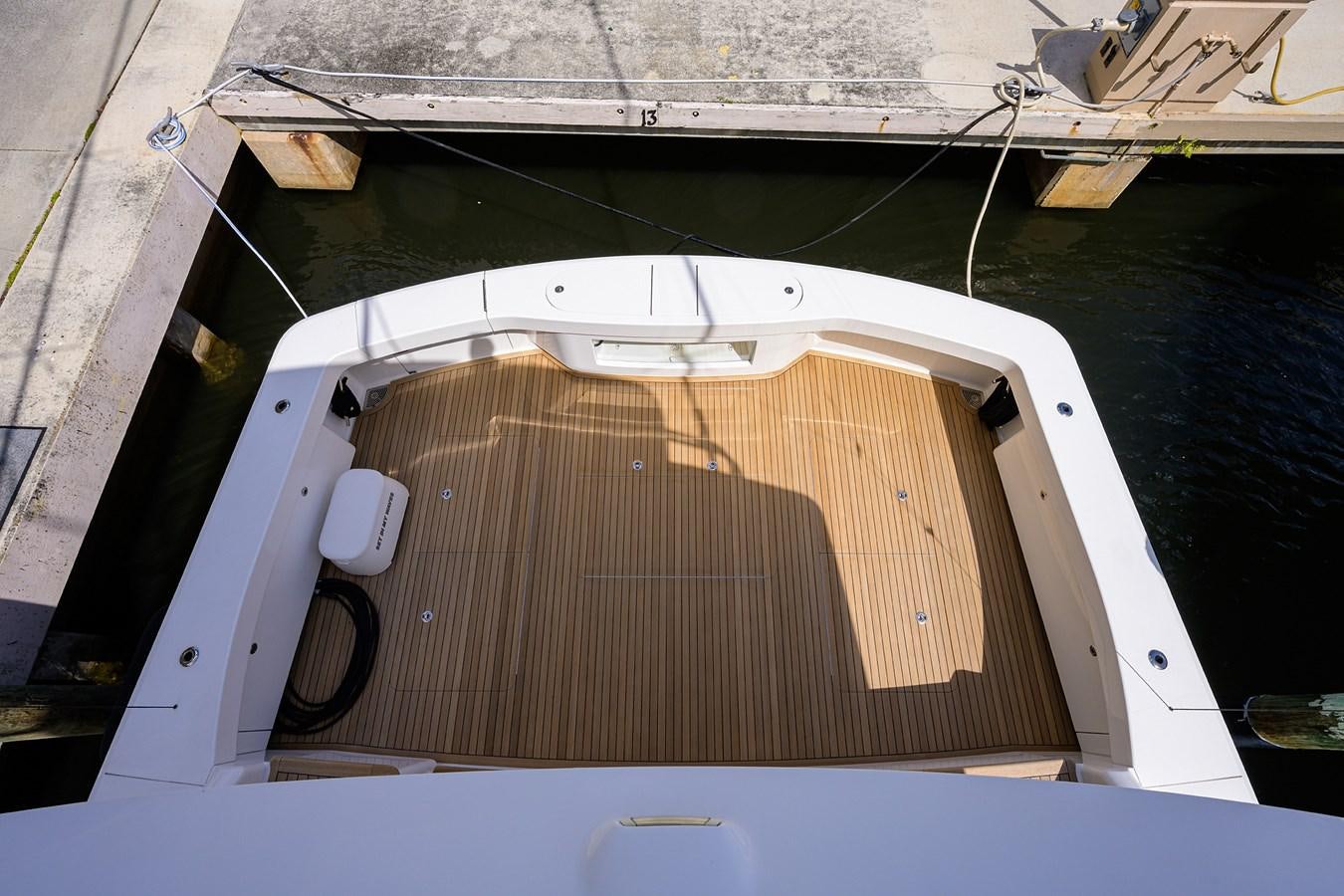 a boat on the water aboard ENCLOSED BRIDGE Yacht for Sale