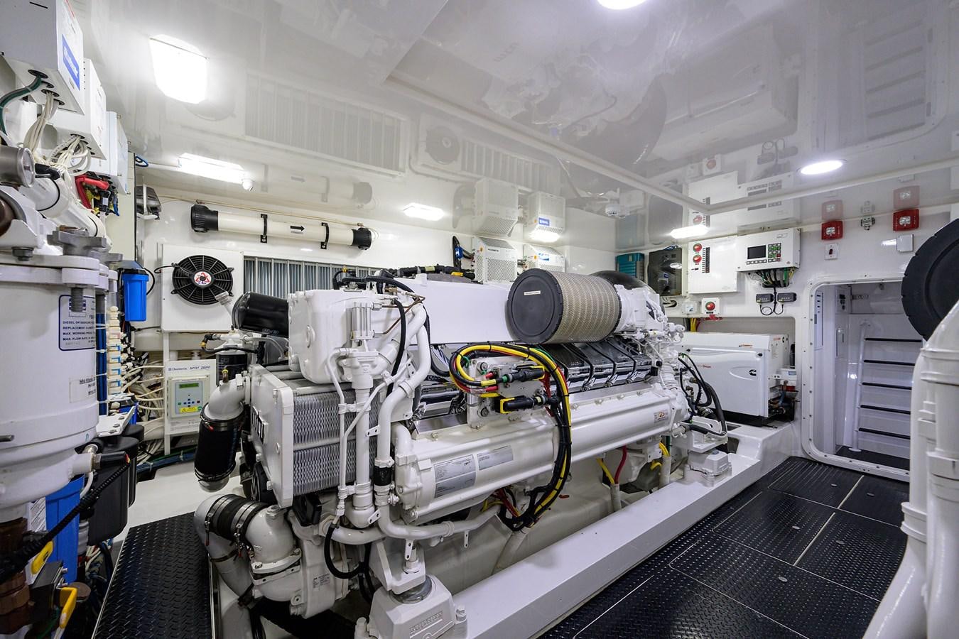 a room with machinery aboard ENCLOSED BRIDGE Yacht for Sale
