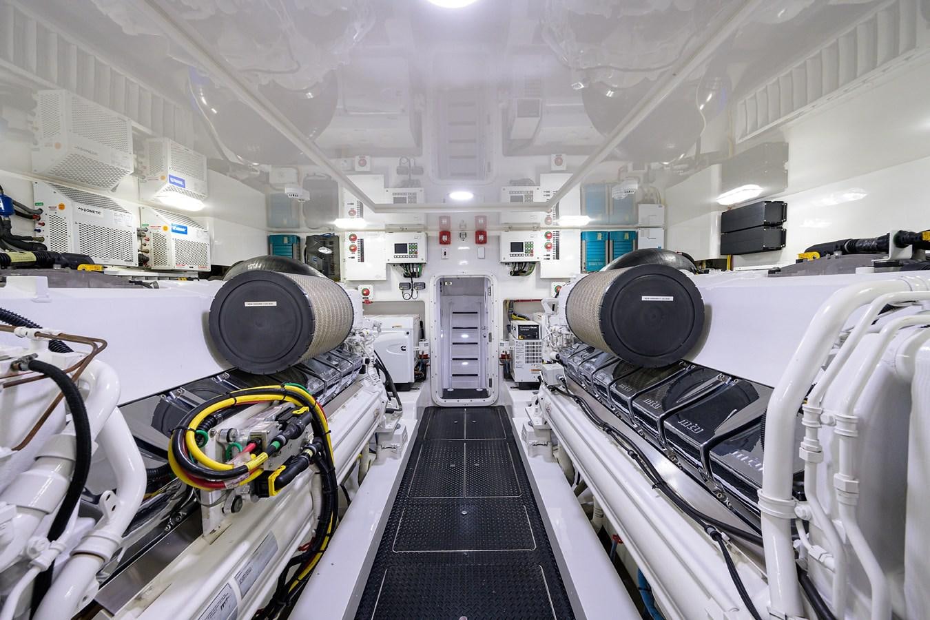 a large room with large machines aboard ENCLOSED BRIDGE Yacht for Sale