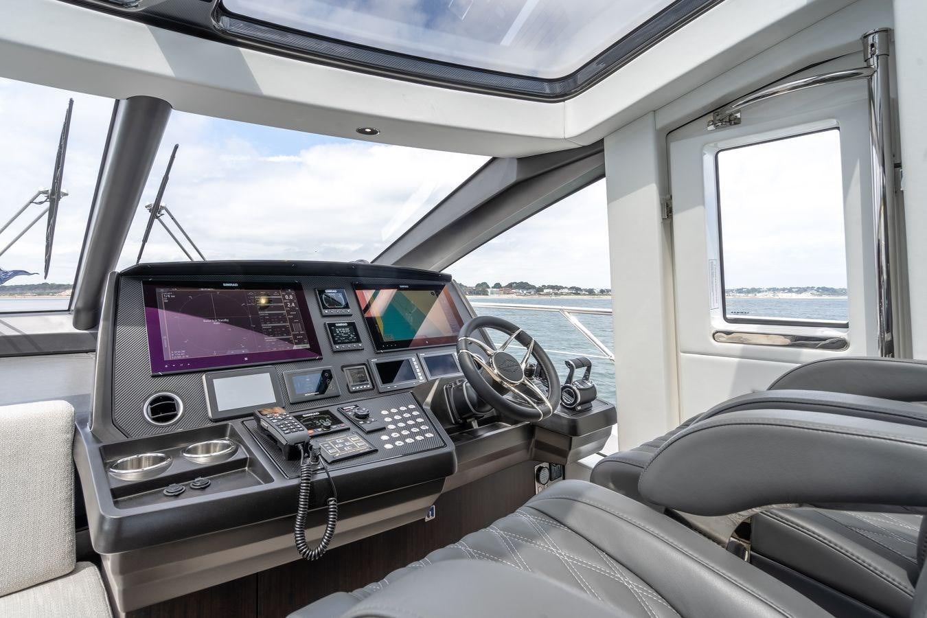 inside of a car aboard PREDATOR 74 XPS Yacht for Sale