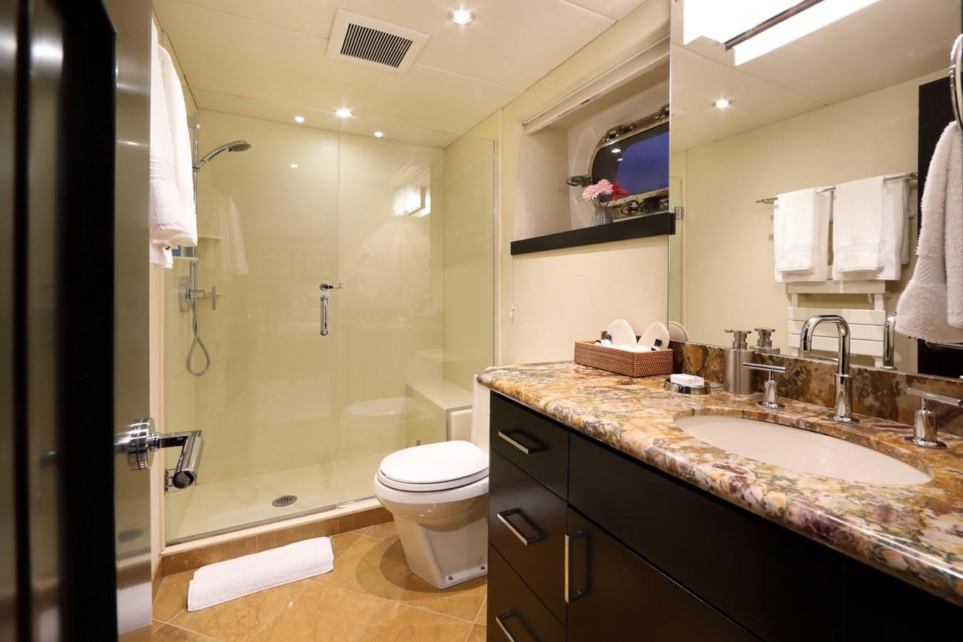 a bathroom with a sink and a toilet aboard L'ALBATROS Yacht for Charter