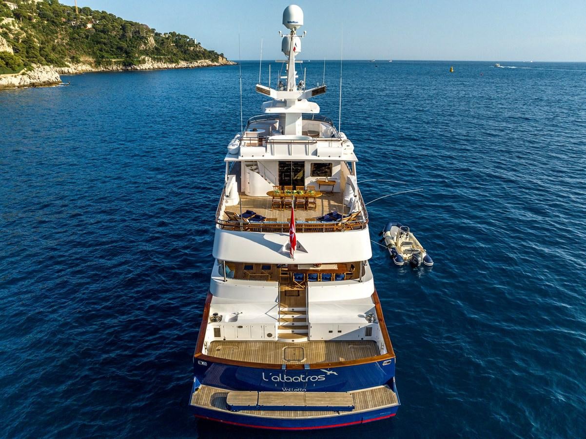 a boat in the water aboard L'ALBATROS Yacht for Sale