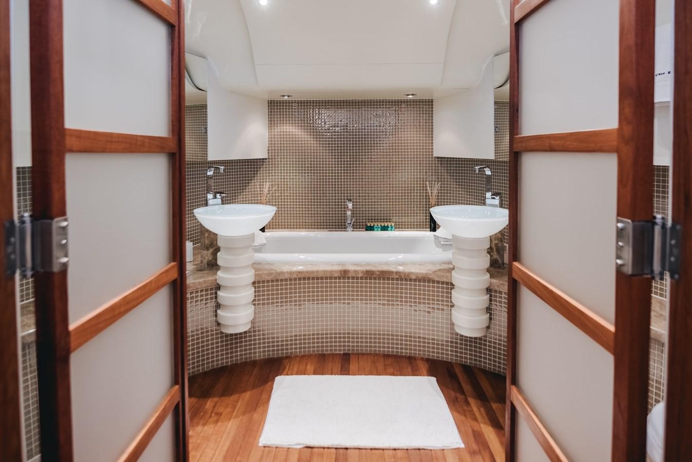 a bathroom with a sink and a toilet aboard ONE BLUE Yacht for Sale