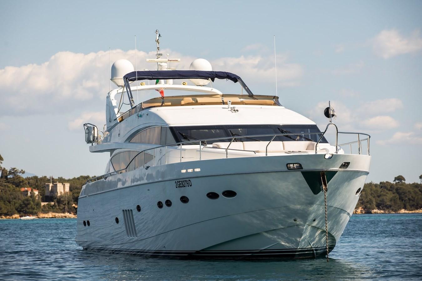 a white boat on the water aboard 2009 PRINCESS 85 Yacht for Sale