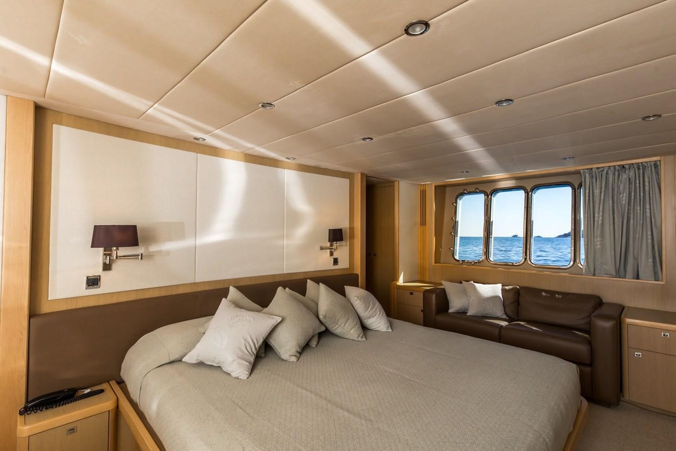 a large bed in a hotel room aboard 2009 PRINCESS 85 Yacht for Sale