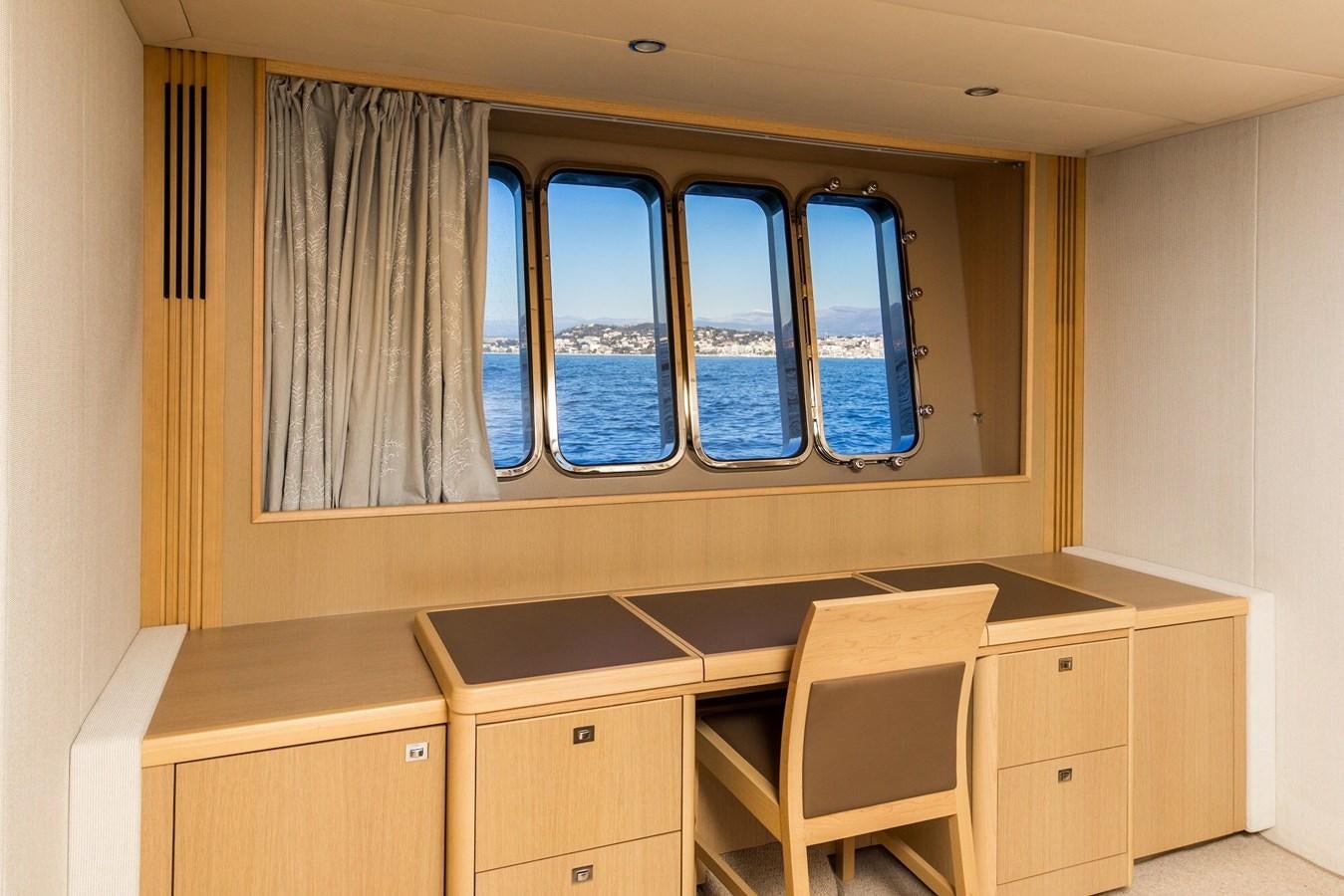 a room with a desk and a chair aboard 2009 PRINCESS 85 Yacht for Sale