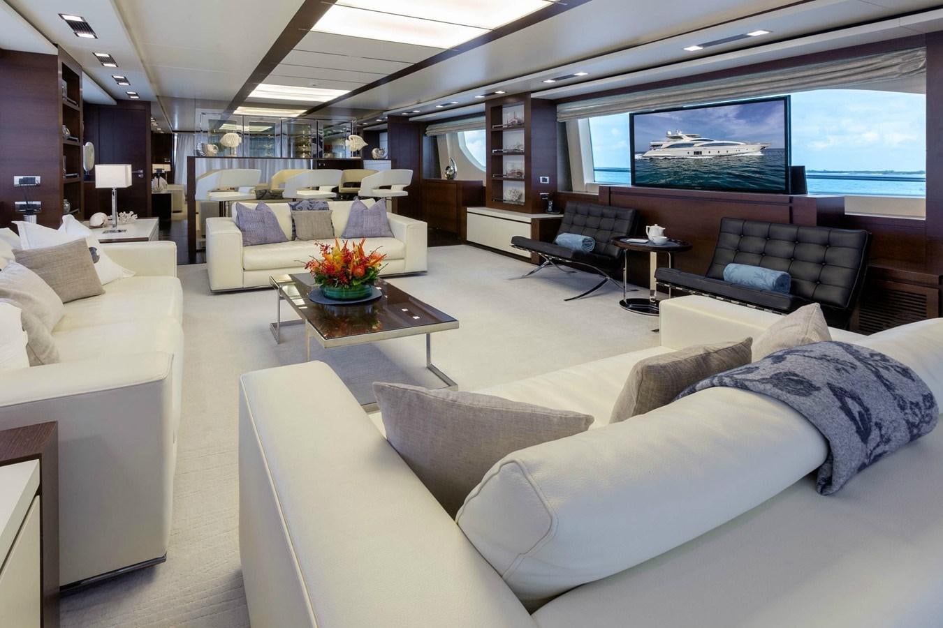 a living room with a large window aboard INSIEME Yacht for Sale