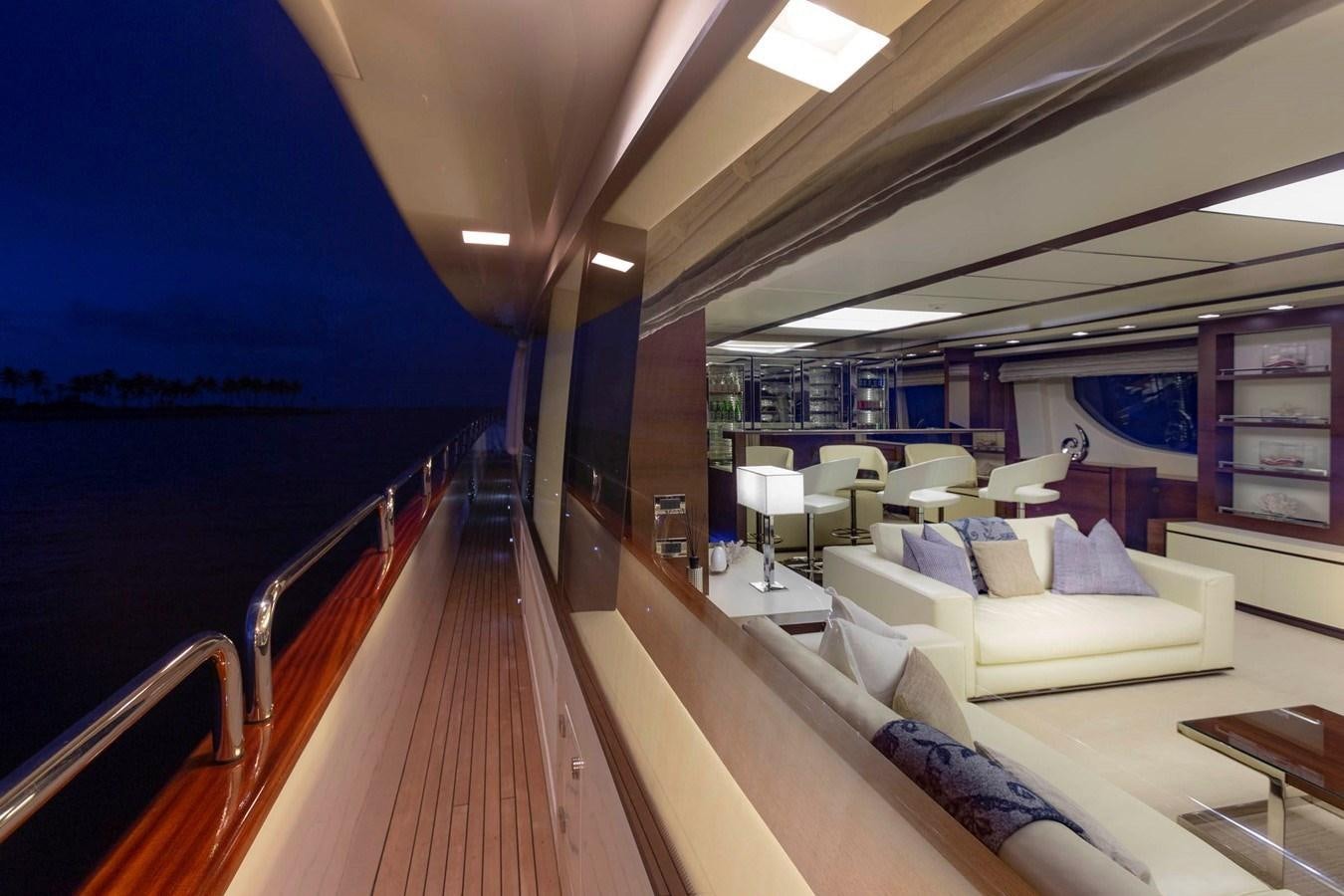 a long wooden boat on a boat aboard INSIEME Yacht for Sale