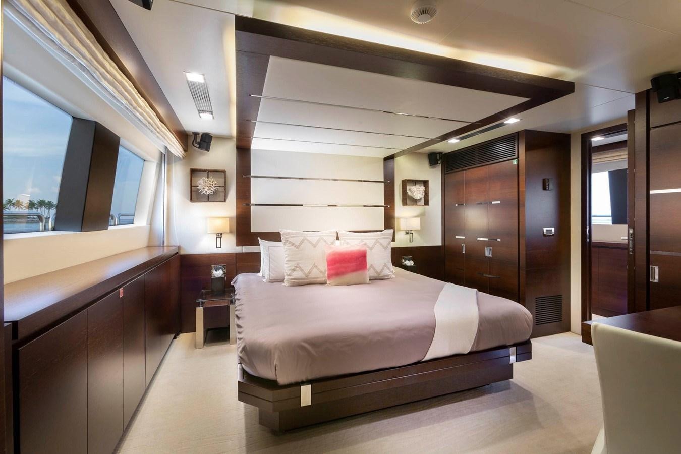a large bed in a hotel room aboard INSIEME Yacht for Sale