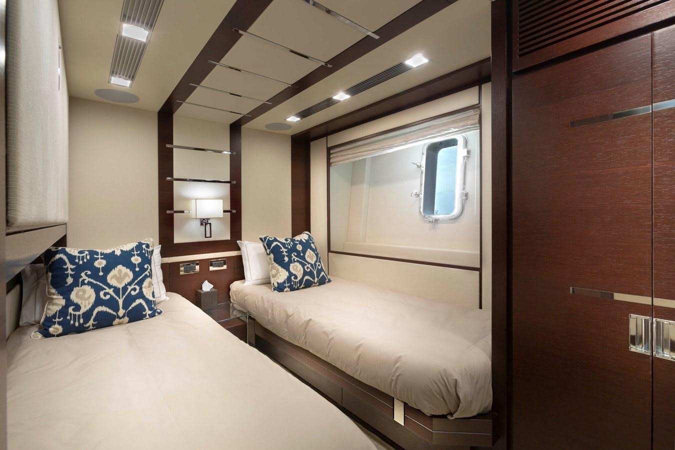 a room with two beds aboard INSIEME Yacht for Sale