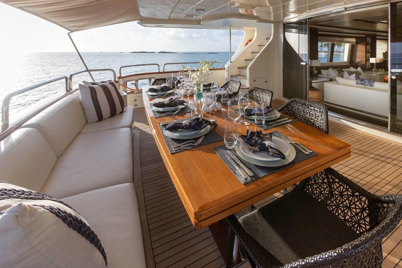 a dining table on a boat aboard INSIEME Yacht for Sale