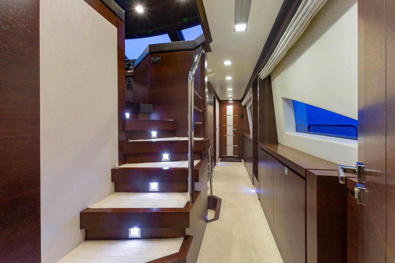 a staircase in a building aboard INSIEME Yacht for Sale