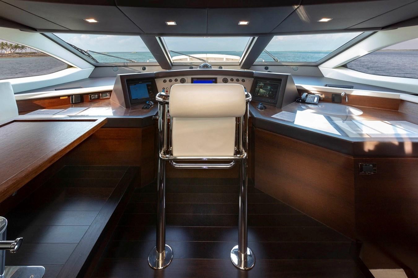 a chair in a vehicle aboard INSIEME Yacht for Sale