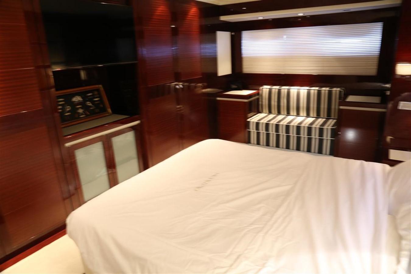 a bed in a room aboard AMER 86 Yacht for Sale