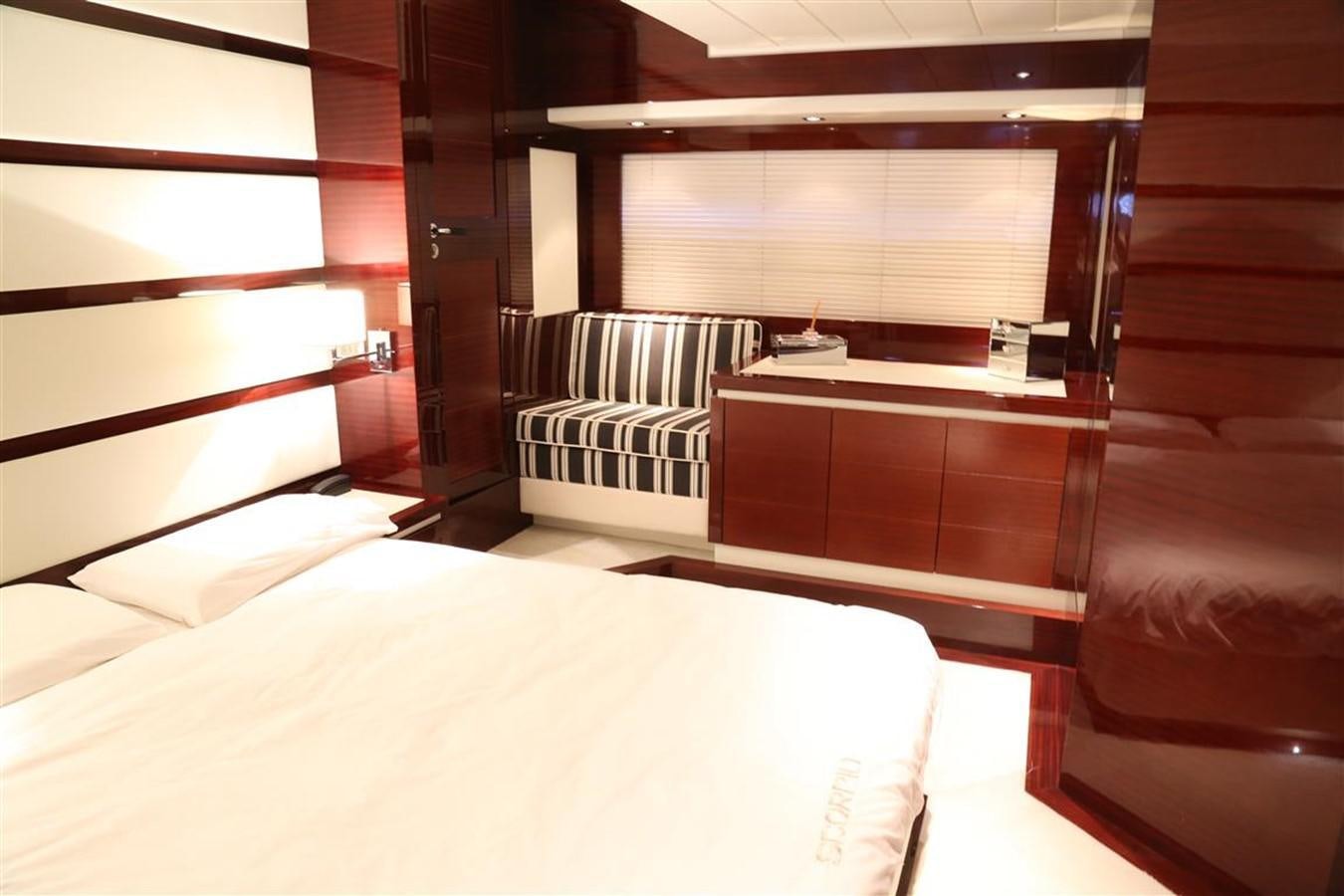 a room with a bed and a desk aboard AMER 86 Yacht for Sale
