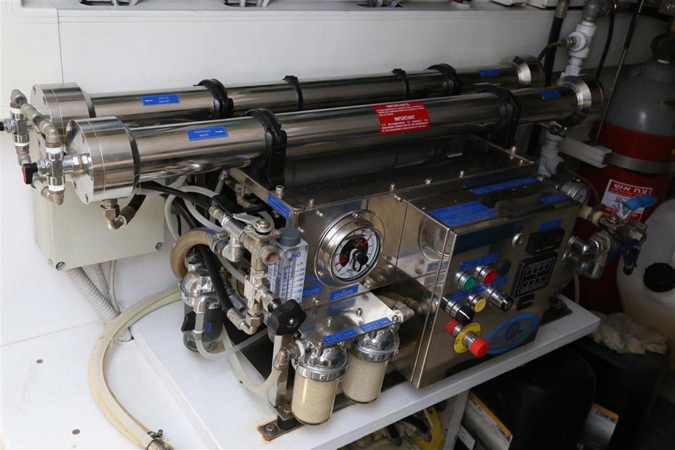 a machine with a blue and white object on the side aboard AMER 86 Yacht for Sale