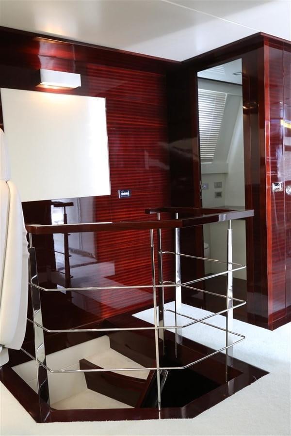 a black and white staircase aboard AMER 86 Yacht for Sale