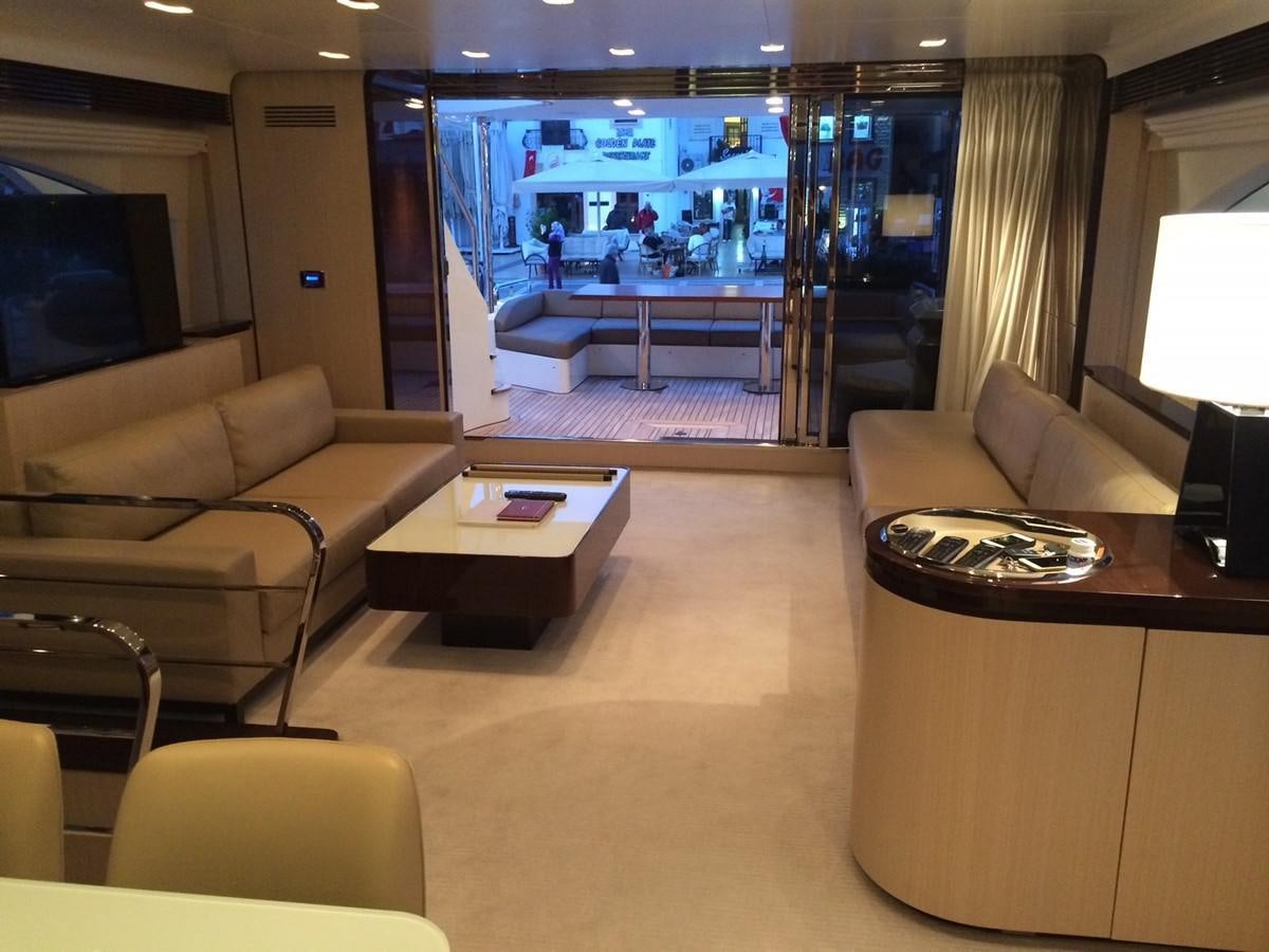 a room with a couch and a tv aboard AZ84 Yacht for Sale