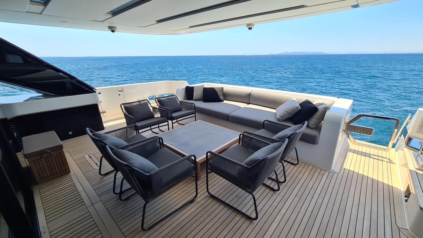 a room with a table and chairs aboard 2021 SANLORENZO SD96 #95 Yacht for Sale