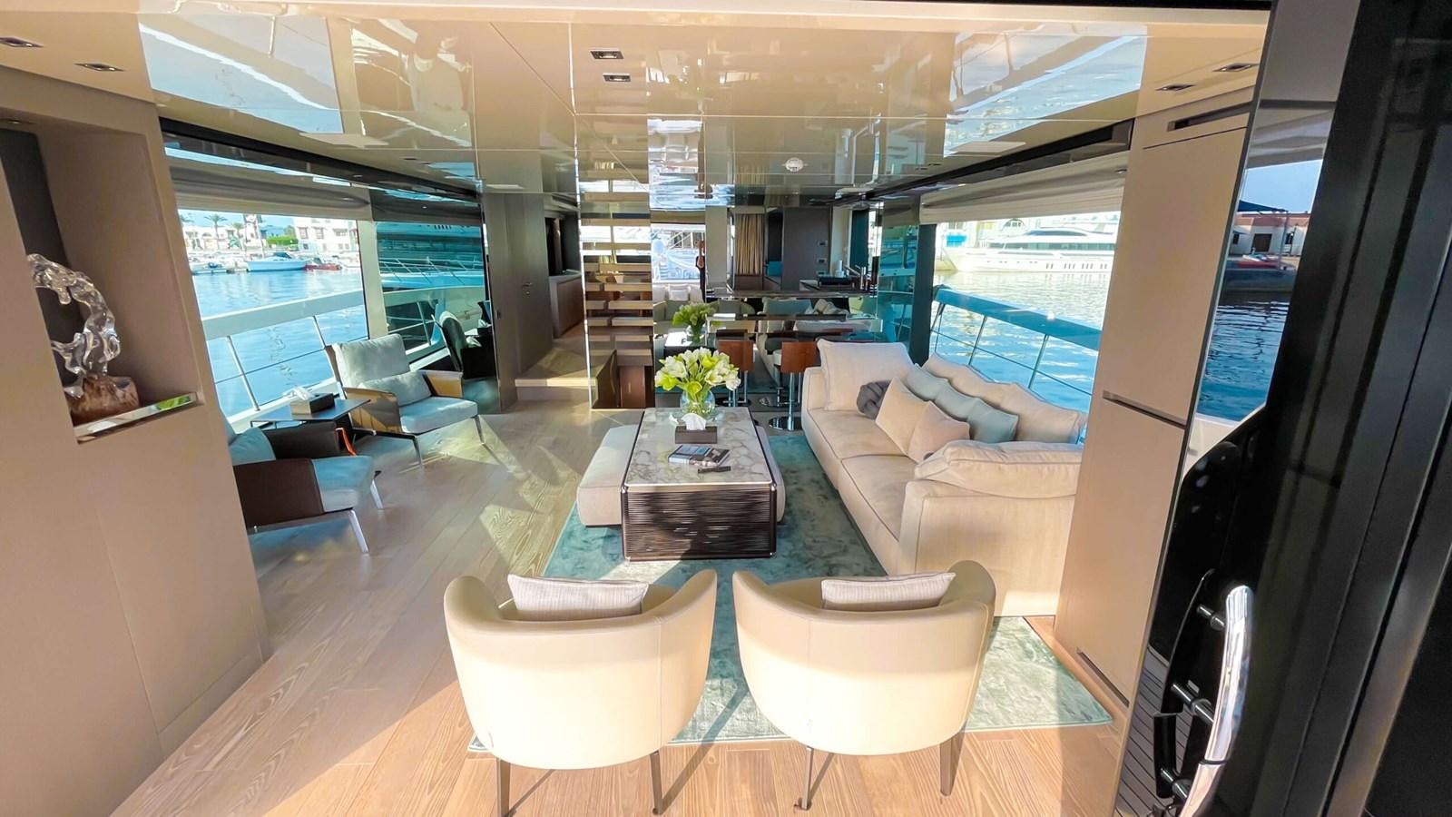 a living room with a large window aboard 2021 SANLORENZO SX88 #47 Yacht for Sale