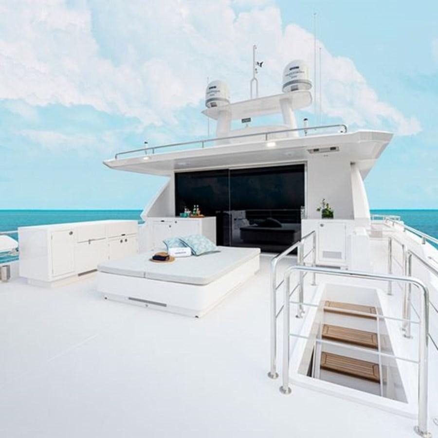 a white building with a black roof aboard ONE MORE TIME Yacht for Sale
