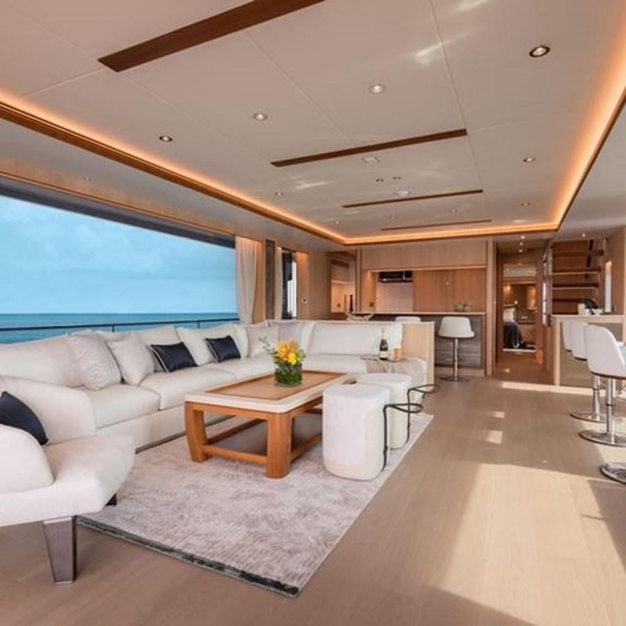 a living room with a large window aboard ONE MORE TIME Yacht for Sale