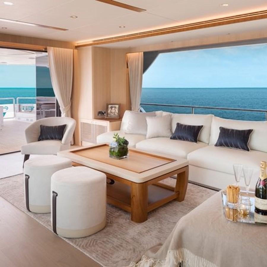 a living room with a large window aboard ONE MORE TIME Yacht for Sale