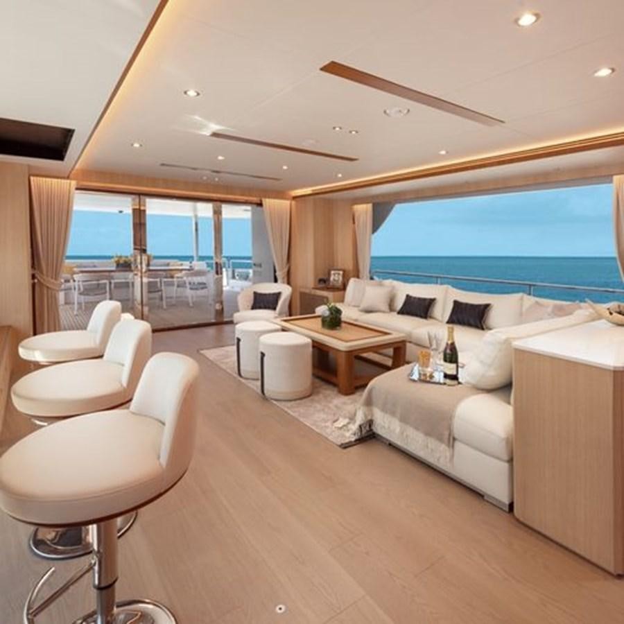 a living room with a large window aboard ONE MORE TIME Yacht for Sale