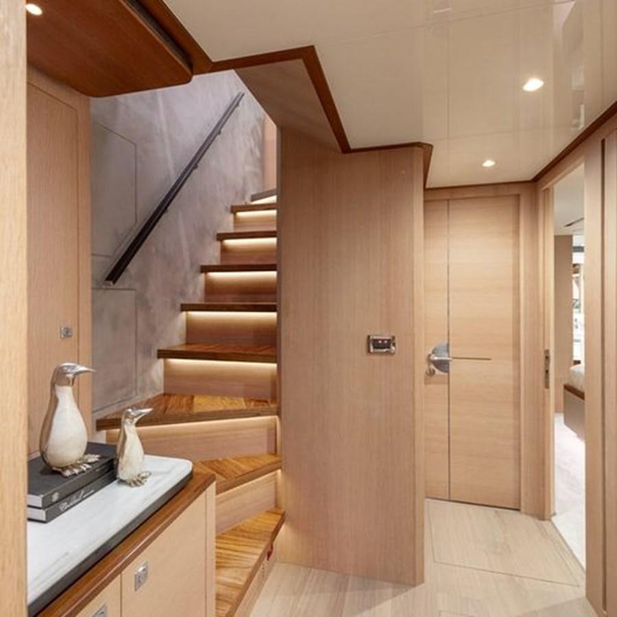 a modern looking staircase aboard ONE MORE TIME Yacht for Sale