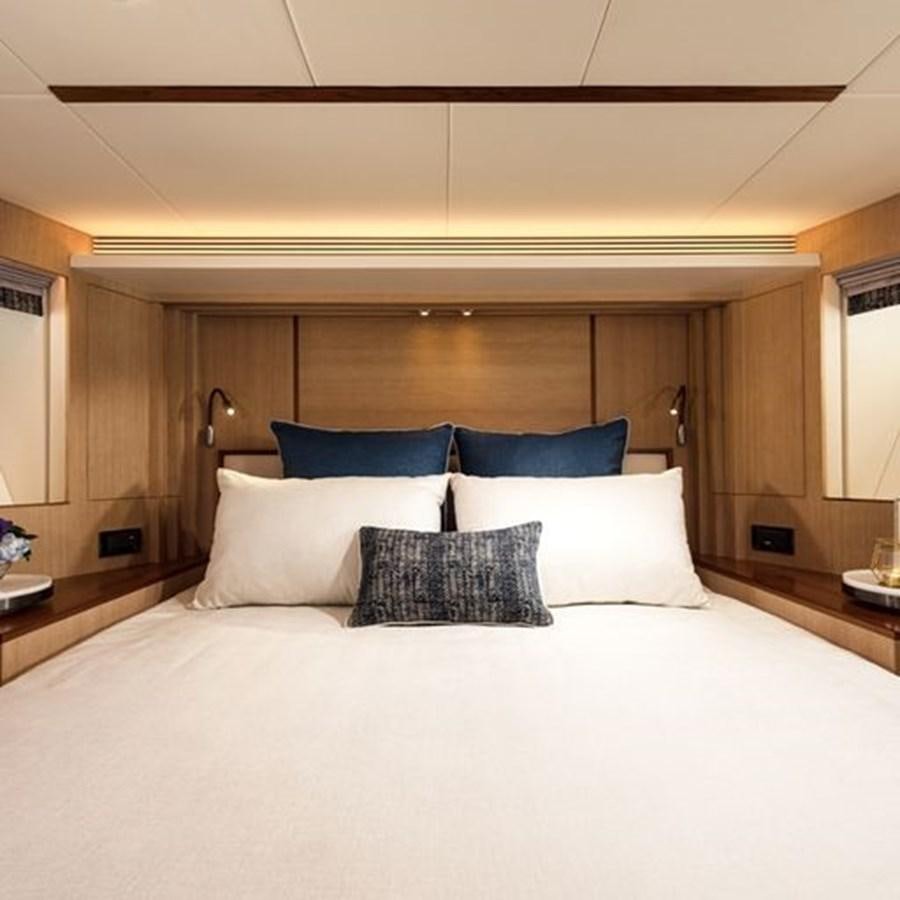 a bed with pillows aboard ONE MORE TIME Yacht for Sale