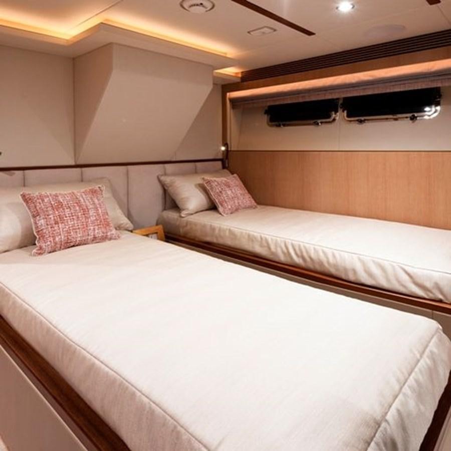 a couple of beds in a hotel room aboard ONE MORE TIME Yacht for Sale