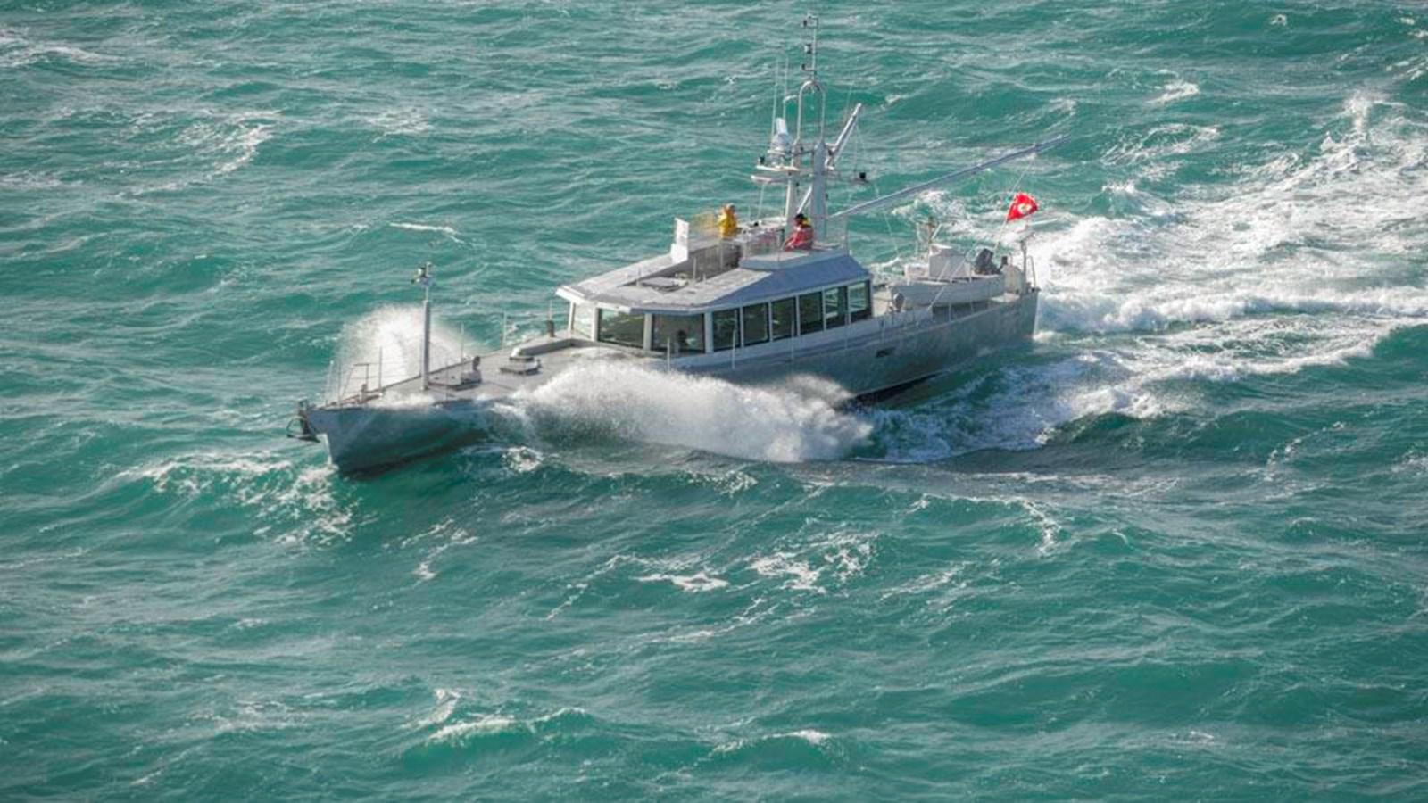 a boat in the ocean aboard WIND HORSE Yacht for Sale