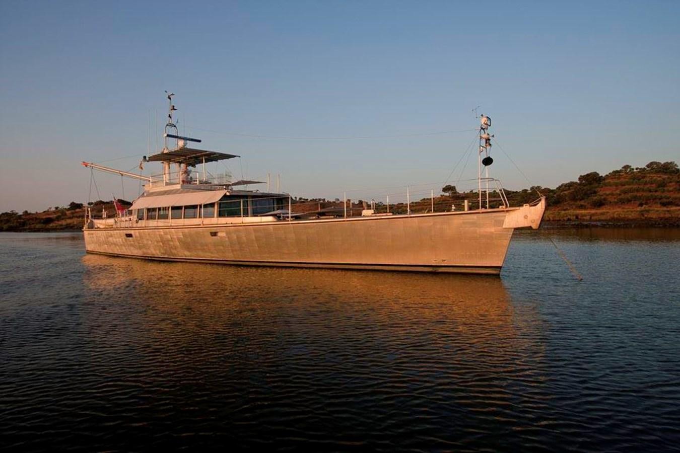 a large boat in the water aboard WIND HORSE Yacht for Sale