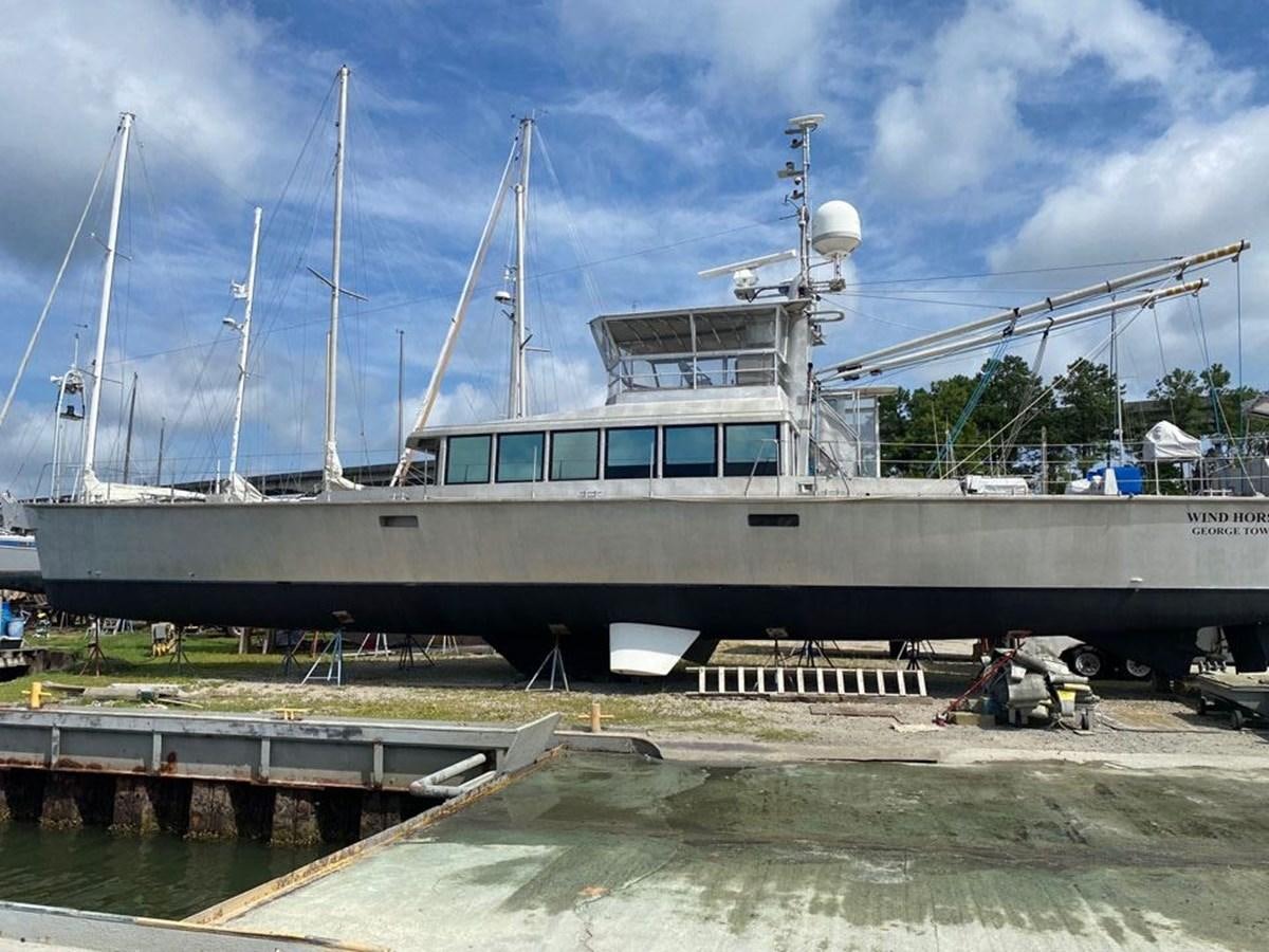 a boat docked at a pier aboard WIND HORSE Yacht for Sale