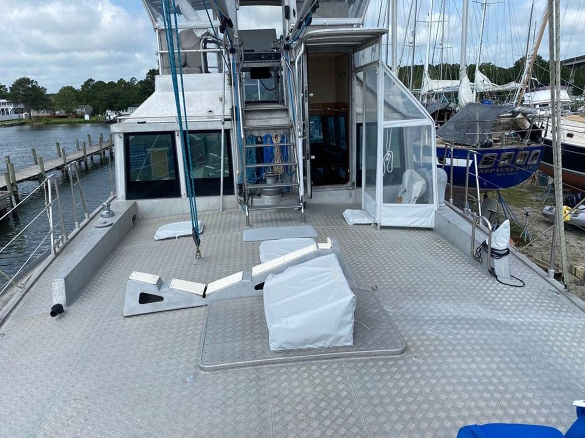 a boat dock with a boat on it aboard WIND HORSE Yacht for Sale